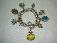 1950s Unique and Fabulous Chunky Glass and Goldtone Charm Bracelet 