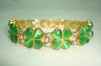 £28.00 -  Green Glass Four Leaf Clover Goldtone and Silvertone Link Bracelet